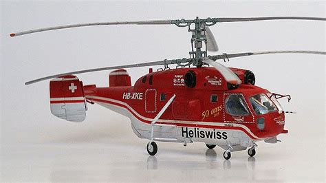 A Red And White Helicopter On A White Background