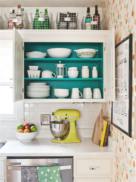 The top recommended among kitchen soffit ideas is to install false cabinet doors above the normal kitchen cabinets. 10 Ideas for Decorating Above Kitchen Cabinets | HGTV
