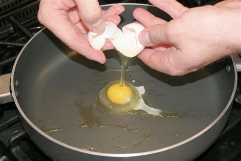 eggs cooking fried breaking egg pan crack yolk whole cookbook important very