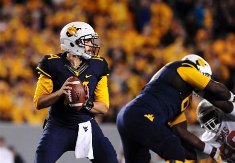 Wvu football / 2 months ago. Which WVU Football Uniform Combination Is The Best? - The Smoking Musket