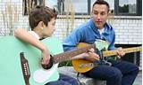 Pictures of Teaching Kids Guitar