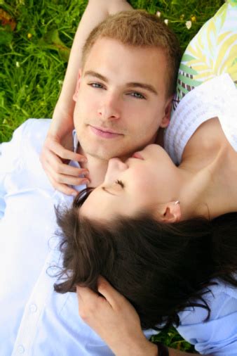 Beautiful Couple On A Green Meadow Stock Photo Download Image Now