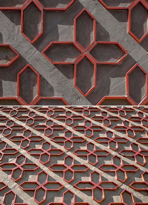 A Patterned Accent Wall Made From Cut Clay Roof Tiles Is Featured On