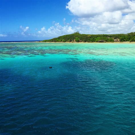 guam is just super photogenic the waters off the village of piti guam coastline village