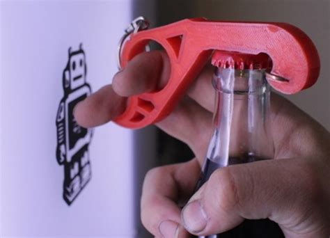 A Bottle Opener Being Used To Open A Coca Cola Bottle In Front Of A
