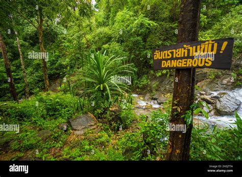 Dangerous Sign Over Waterfall Background Stock Photo Alamy