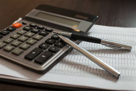 Accounting Documents Pens And Calculator Closeup Stock Photo Image