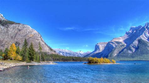 Beach River Surrounded Stone Mountains Under Blue Sky Hd Nature