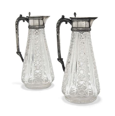 A Pair Of Russian Silver Mounted Cut Glass Claret Jugs