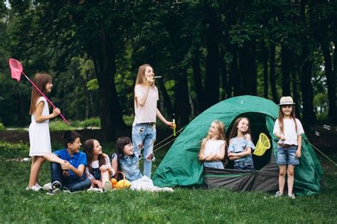 Group Of Teens Camping In Forest Free Photo