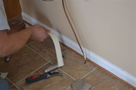 Start laying the flooring along one wall, working row by row. How to install vinyl flooring | Pro Construction Guide
