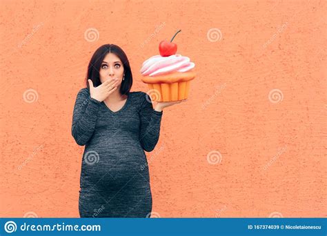 Pregnant Woman Craving Sweets Holding Huge Cupcake Stock Image Image