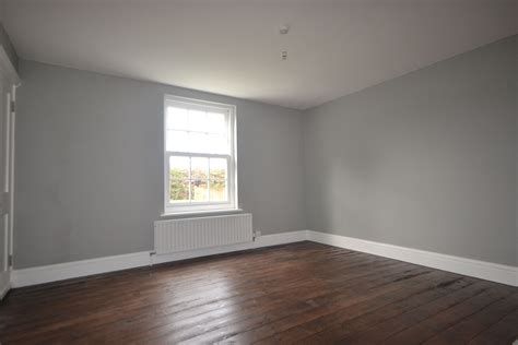 This dove grey colour is perfect for adding a sense of calm sophistication to any interior wall. Lounge with reclaimed wood floor in walnut varnish and ...