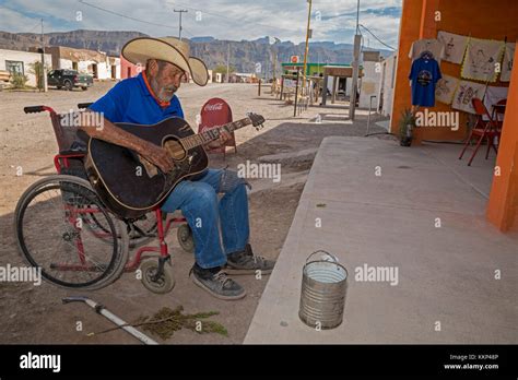 Boquillas Del Carmen Coahuila Mexico A Man In A Wheelchair Plays A