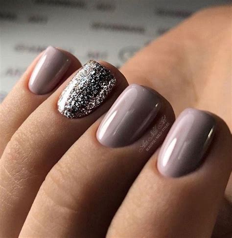 Beautiful Manicure With A Purple Based Mauve Gray Color And A Sparkly