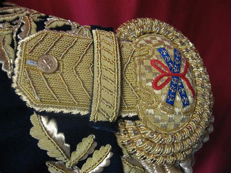 Also spelt epaulet) is a type of ornamental shoulder piece or decoration used as insignia of rank by armed forces and other organizations. EmpireCostume - Maréchal d'Empire- Épaulettes - La paire