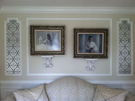 Photographs Hung Within Molding Use Of Wallpaper Framed By Molding