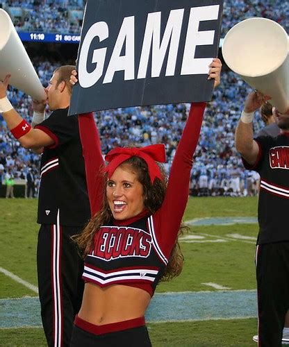gamecocks cheerleader a cheerleader holds up a game sign… flickr