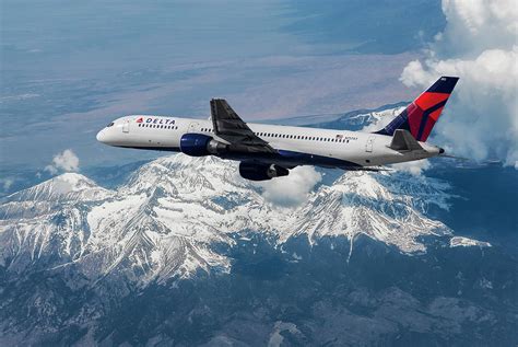 Delta Air Lines Boeing 757 Over Snowcapped Mountains Mixed Media By