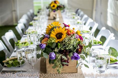 The flowers, especially the roses and hydrangeas. sunflowers in a wine box | Cape cod wedding flowers ...