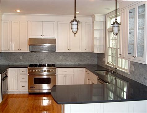 Fieldstone cabinetry has been creating quality cabinetry for 35 years in sioux falls, ia and is comprised of a team of craftsman that take pride in every handcrafted cabinet that they build. Beautiful White Cabinet Kitchen with carrara marble ...