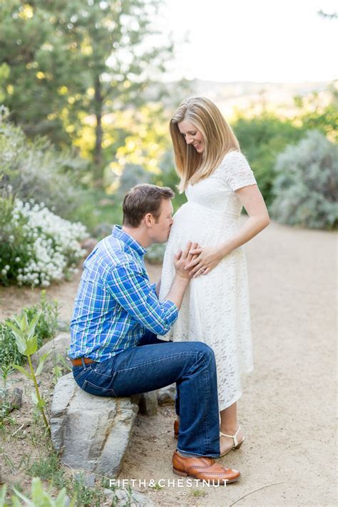 Husband Kisses His Wife S Pregnant Belly For Spring Reno Maternity Portraits By Reno Maternity P
