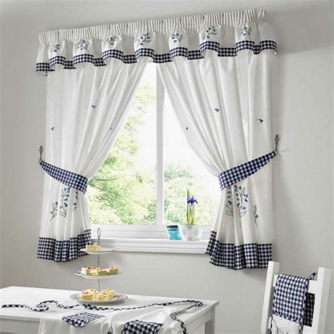 We suggest you consider the images and pictures of black and white kitchen curtains, interior ideas with details, etc. Curtain Ideas: Kitchen curtains with blue in them ...