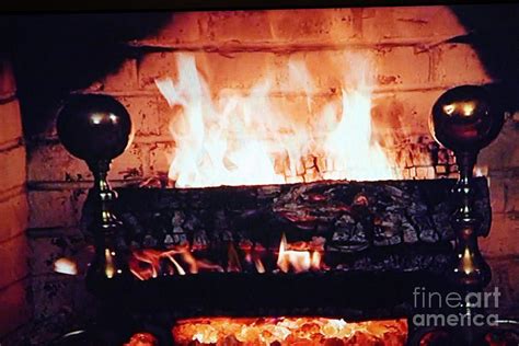 A live fire on tv (or, more likely, a looped fire). Wpix Channel 11 Yule Log Photograph by John Telfer