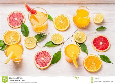 Citrus Juices In Glass And A Slice Of Orange Grapefruit And Lemon