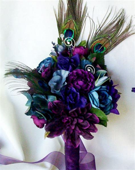 Get inspired by these stunning florals to help you determine the perfect bouquet color palette for your upcoming wedding day! Wedding accessories Peacock Bridal Bouquets Plum PurpleTeal