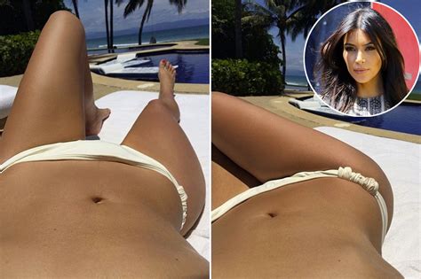 Kim Kardashian Shows Off Toned Tummy In Sexy Bikini Selfies As She