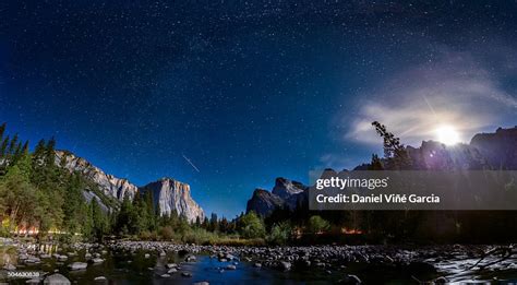 The Milky Way Over El Capitan And Half Dome Mountain From Merced River