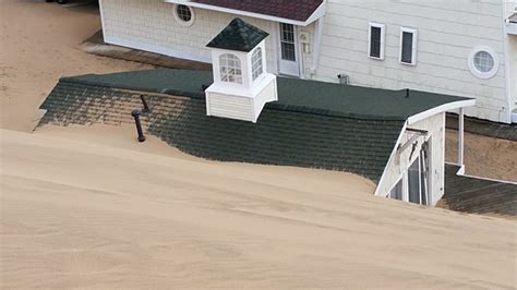 See The House Being Buried By Sand At Silver Lake