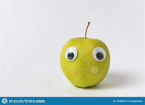 Apple with boy face stock photo 28494952 : Cute Apple With Funny Face On White Background. Green Apple With Googly Eyes Stock Photo - Image ...