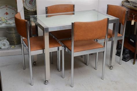 Order a new dinette — made by a company using its original designs produced from 1949 to 1959. Chrome and Glass Table With 4 Chrome Upholstered Chairs Dinette Set at 1stdibs