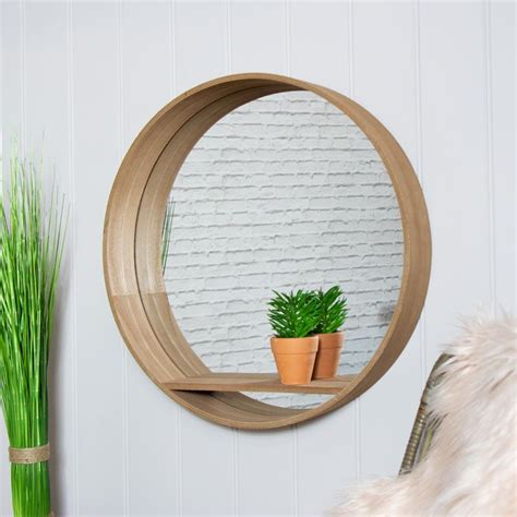 The hexagon tile and rounded honeycomb patterns are finding their way into. Large Round Mirrored Wall Unit in 2020 | Large round ...