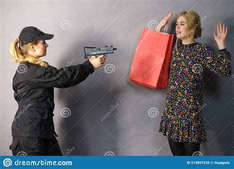 Security Guard And Shoplifter Stock Image Image Of Shopping Clothing 214897235
