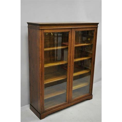 How much does the shipping cost for oak bookcase with glass doors? Antique Golden Oak Wood Glass Two Door Small Mission ...