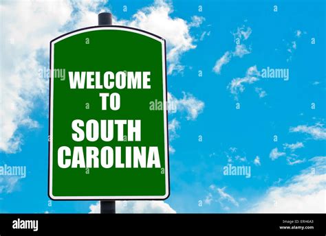 Green Road Sign With Greeting Message Welcome To South Carolina