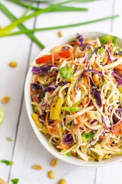 Asian Cabbage Slaw With Peanut Sesame Dressing Bites Of Wellness