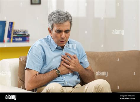 Old Man Chest Pain Hi Res Stock Photography And Images Alamy