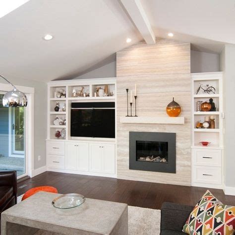 White built ins around the fireplace before and after. Asymetrical Built In Bookcase With TV And Fireplace Design ...