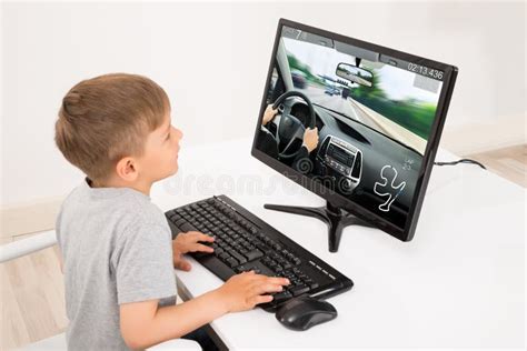 Boy Playing Game On Computer Stock Photo Image Of Sitting Race 86364774