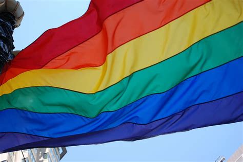 hd wallpaper rainbow flag under cloud sky pride gay love pride rights wallpaper flare