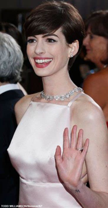 Photos From Anne Hathaway S Nipples To Salma Hayek S Cover Up Best And Worst Oscars Dresses 2013