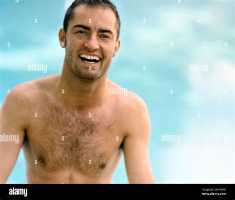 A Young Man Cooling Off In A Pool Stock Photo Alamy