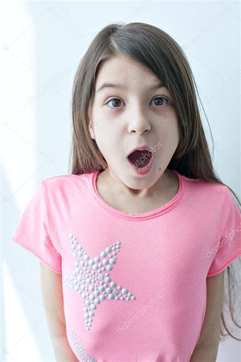 Little Girl Making A Funny Face Stock Photo By ©mukhomedianova 105874878