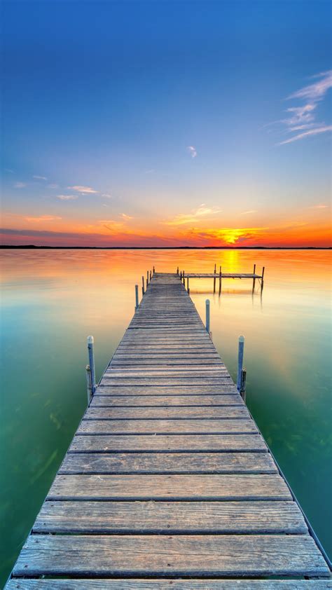 Download Wallpaper 1350x2400 Pier Lake Sunset Water Horizon Iphone 876s6 For Parallax
