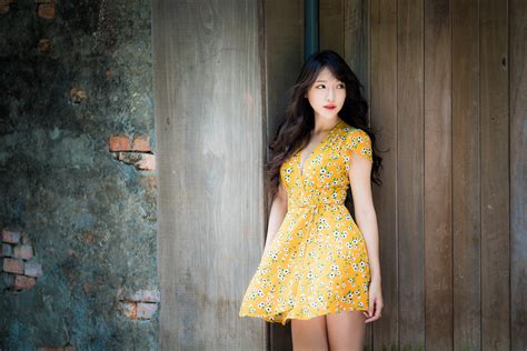 wallpaper asian model brunette long hair looking away portrait cleavage yellow dress