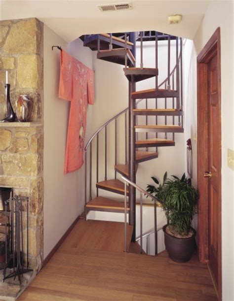 The spirals take in less space when constructed from the interior. Staircase Designs For Small Spaces | Spiral staircase a step to saving floor space | SILive.com ...